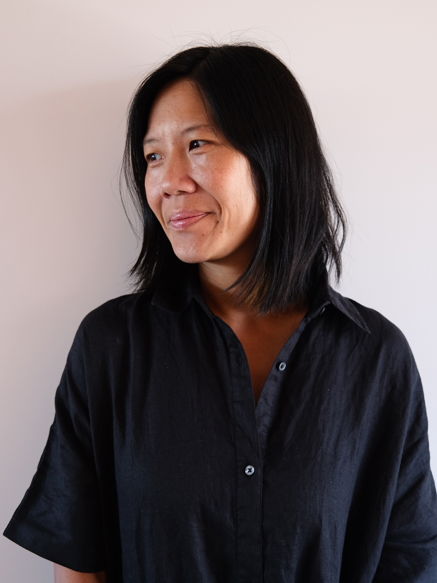 A portrait photograph of Maggie Tang